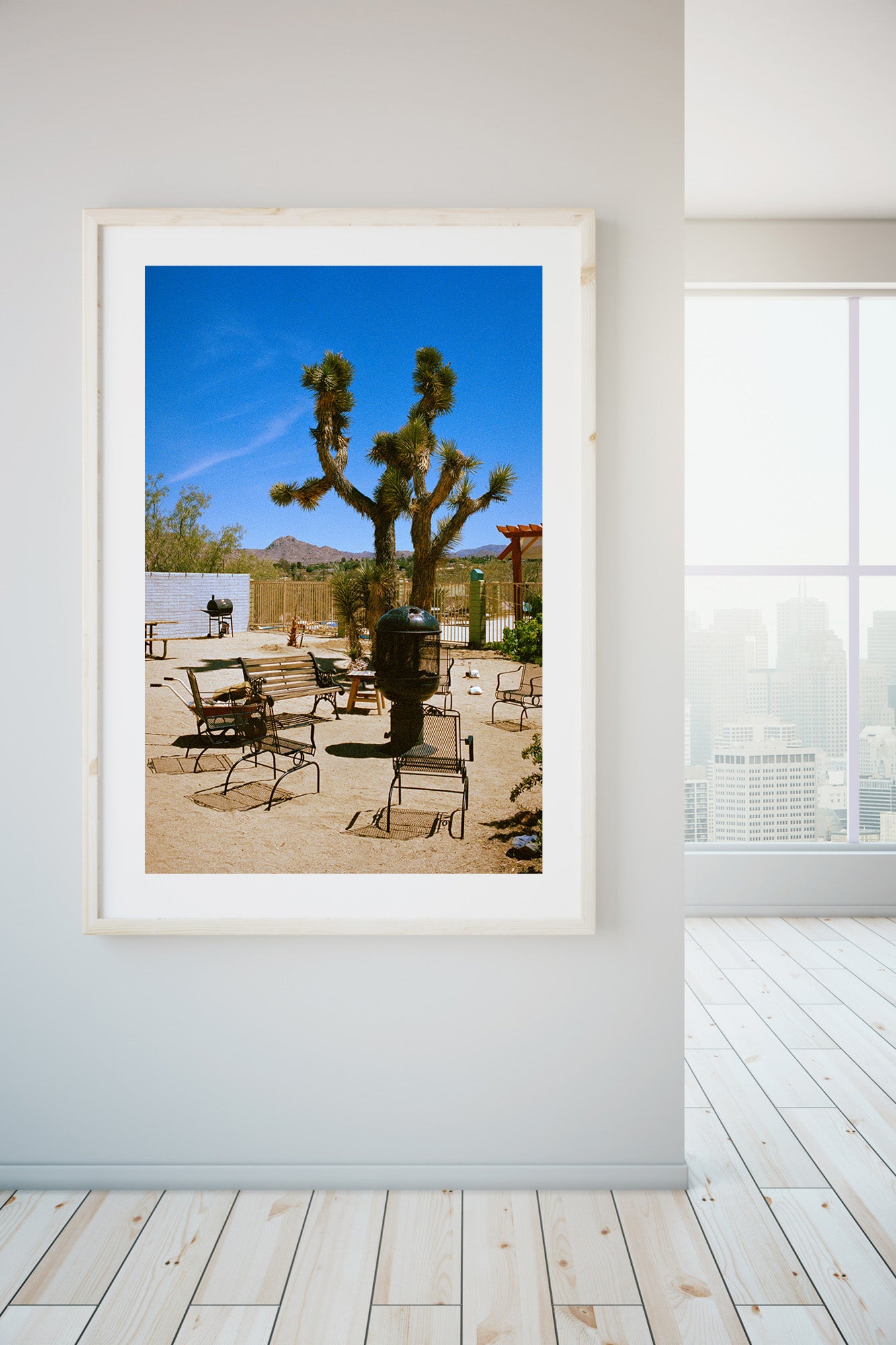 A room with a picture. A photographic print of the joshua treem motel california, swimimg pool at joshua tree's Artwork, Prints wall art California Photographic prints Ocean Palm Springs Framed artwork, Photography,  Film photography, Vintage photo style,  Interior design, beach, Buy Art, photography art, Joshua tree print, Joshua tree, buy art, Prints for sale, art prints, color photography, 
