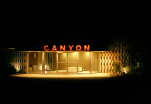 "A night image of art deco building in Palm Springs California.It is yellow and black in colour theme with a vintage look. The photo has been shot at night.Artwork, Prints wall art California Photographic prints Ocean Palm Springs Framed artwork, Beach Posters, Photography, Film photography, Vintage photo style, Interior design, beach, 