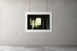 A photograph of the inside doorway in a fast train to Osaka Japan. The doorway is green. Artwork Prints, wall ar,t Japan, Osaka, Photographic prints,, Framed artwork,  Posters  Photography Photography for sale, Film photography, Vintage photo style,  Interior design, Film photography, Pictures framed, artwork, travel photography, 35mm film 
